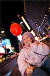 Girl with Balloon in Times Square, New York City, New York, USA