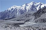 The Karakorum (Karakoram) Highway on the Chinese side, with River Giz, Xinjiang, China, Asia