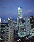 City skyline in the evening, with the twin towers of the Petronas Building, Kuala Lumpur, Malaysia, Asia