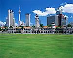 The city skyline from Merdeka Square with the Sultan Abdul Samad Building and Petronas Towers in the centre of Kuala Lumpur, Malaysia, Southeast Asia, Asia