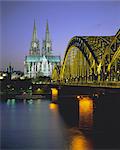 Bridge over the River Rhine, and cathedral (Dom), Cologne (Koln), North Rhine Westphalia, Germany, Europe