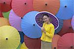 Portrait of a young woman, Bo Sang umbrella village, Chiang Mai, northern Thailand, Asia