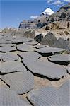 Buddhist prayer stones at sky burial site above Tarboche in Lhu Chu canyon, beneath sacred mountain, on kora route, Mount Kailas (Kailash), Tibet, China, Asia