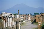 Vesuvius volcano from ruins of Forum buildings in Roman town, Pompeii, Campania, Italy, Europe