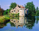 Scotney Castle refelcted in lake, Kent, England