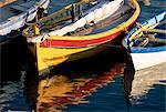 Colourful boats reflected in the water of the harbour, Sete, Herault, Languedoc-Roussillon, France, Europe
