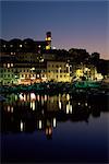 View across harbour to the old quarter of Le Suquet, at night, Cannes, Alpes-Maritimes, Cote d'Azur, French Riviera, France, Mediterranean, Europe