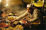 Portrait of a man serving food from his stall in the Djemaa el Fna market in Marrakesh, Morocco, North Africa, Africa