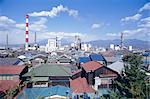 Industrial complex of paper mill and city skyline, Yoshiwara, Japan, Asia