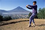 T'ai chi exercises at dawn, Agua volcano, Antigua, Guatemala, Central America