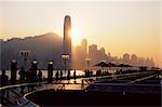Avenue of Stars, Tsim Sha Tsui, Kowloon, with Victoria Harbour and skyline of Hong Kong Island in the background at dusk, Hong Kong, China, Asia