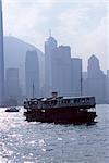 Star Ferry, Victoria Harbour, with Hong Kong Island skyline in mist beyond, Hong Kong, China, Asia