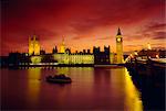 The River Thames and Houses of Parliament at night, London, England, UK