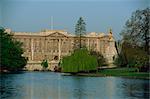 The Victoria Monument and Buckingham Palace, seen from across pond in St. James Park, London, England, United Kingdom, Europe