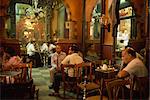 Men smoking hookahs in the interior of the El Fishawy Coffee House in Khan al-Kalili Bazaar in Cairo, Egypt, North Africa, Africa