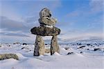 Inukshuk marker at Aupalaqtuq Point, Cape Dorset, Baffin Island, Canadian Arctic, Canada