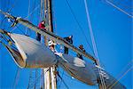 Sail furling at the Living Maritime Museum, Mystic Seaport, Connecticut, United States of America