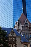 Architectural contrasts, Trinity Church in foreground, and John Hancock Tower behind, Boston, Massachusetts, New England, United States of America (USA), North America