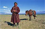 Lake Uureg Nuur, nomad and his horse, Uvs, Mongolia, Central Asia, Asia