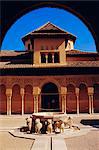 Fountain with 12 stone lions and Patio de los Leones. Palacio Nazaries, Alhambra, Granada, Andalusia, Spain