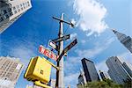 Street signs and skyscrapers, W24th Street, New York City, New York, United States of America, North America