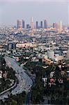 Downtown district skyscrapers and cars on a city highway, Los Angeles, California, United States of America, North America