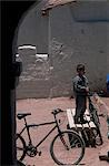 Boy and bike, San Pedro de Atacama, Chile, South America