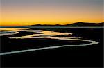 Coucher de soleil sur la baie de Luskentyre, à marée basse, Ouest côte de Sud Harris, Hébrides extérieures, en Écosse, Royaume-Uni, Europe