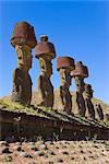 Anakena beach, monolithic giant stone Moai statues of Ahu Nau Nau, four of which have topknots, Rapa Nui (Easter Island), UNESCO World Heritage Site, Chile, South America