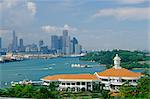 Ferry terminal of popular island resort with Keppel Harbour and the city in the background, Sentosa Island, Singapore