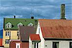 Typical colourful corrugated buildings which are a familiar sight in the city centre of Reykjavik, Iceland, Polar Regions