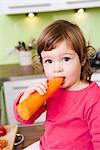 Child eating carrot