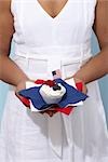Woman Holding Fourth of July Cupcake