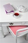 Tea and Books on Desk