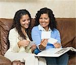 Mother and Daughter Looking at Family Photos