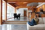 Woman at Home Listening to Music