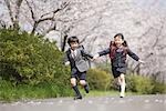 Schoolmate running on road