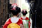 Geisha Women Walking on Street in Kyoto, Japan