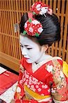 Geisha in Traditional Make-Up and Wearing Kimono