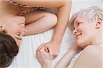 A lesbian couple in bed