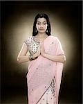 A hindu woman praying