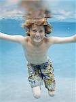 Portrait of a boy swimming