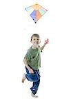 Portrait of a boy flying a kite