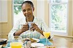 Portrait of a senior woman having breakfast