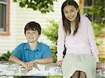 Portrait of a girl and a boy smiling