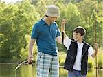 man and his son fishing