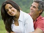 Close-up of a man and a woman smiling