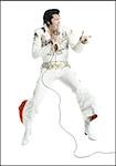 An Elvis impersonator singing into a microphone and jumping