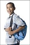 Portrait of a smiling boy with a backpack