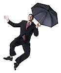 Homme d'affaires, tenir un parapluie et le saut